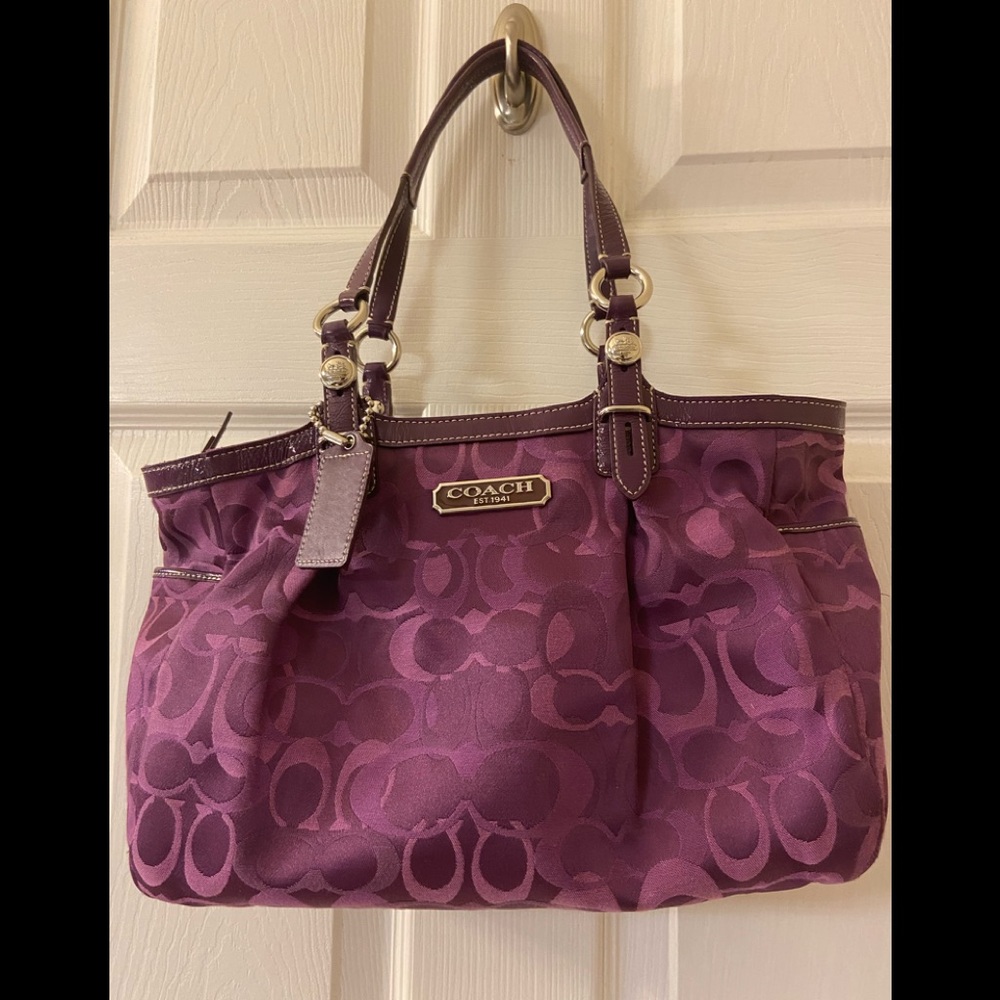 A gorgeous purple Coach bag in amazing condition.